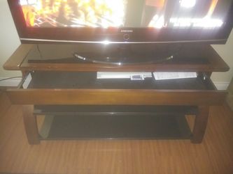 Black glass Tv stand w/pullout drawer