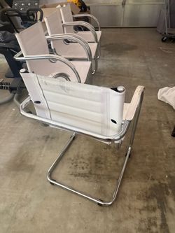 4 vinyl chairs