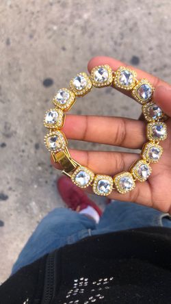 square iced-out tennis bracelet.