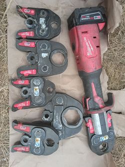 Ring press with tool