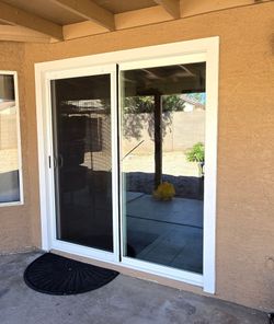 New sliding glass doors with heavy-duty screen—Zero hidden fees.