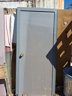 Gray Interior Door with Frame and Brass Knob
