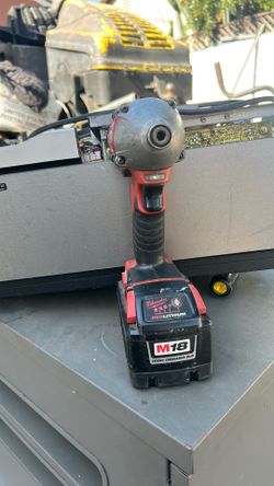 Milwaukee compact drill with battery and charger