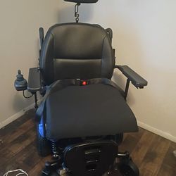 Motorized Wheelchair With Special Tilt Feature 