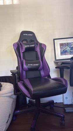 Cute purple gaming chair - reclines and has cushions!