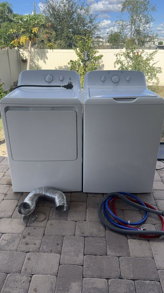 Hotpoint top load laundry pair.
