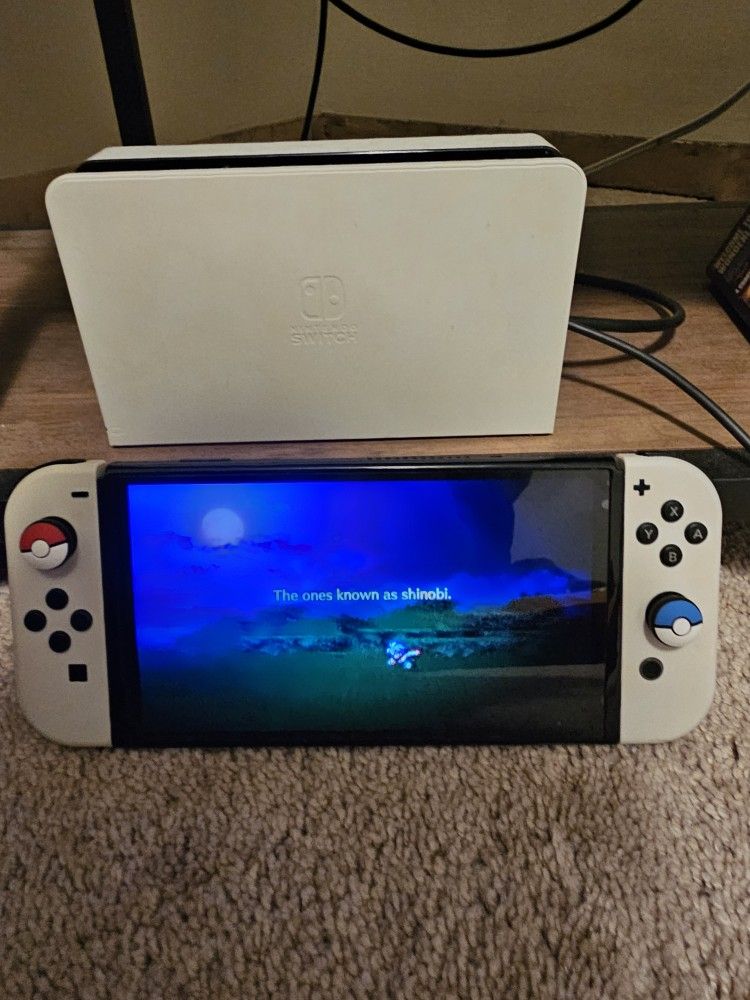 Nintendo Switch OLED - And Choice Of 2 Games, Carrying Case, SD Card