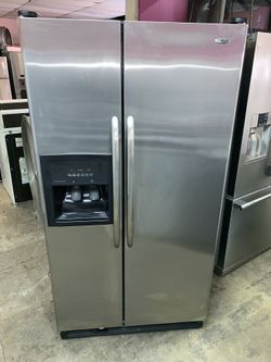 Amana side-by-side stainless steel very clean