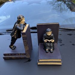 Porcelain bookends young Asian students
$15