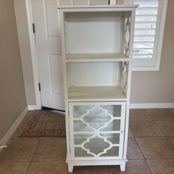 Versatile White Cabinet With A Geometric Tile Design