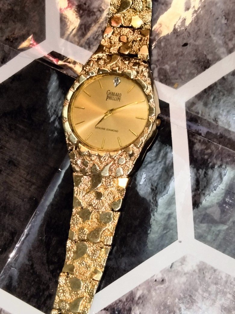 Gerrard Phillip--10K Italian Gold Nugget Watch