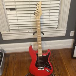 Red Electric guitar no name strat