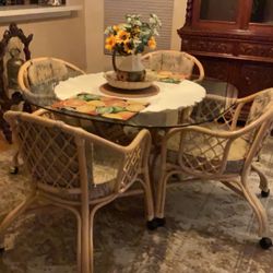 Heavy Rattan Glass Top Table And 4 Caster Chairs