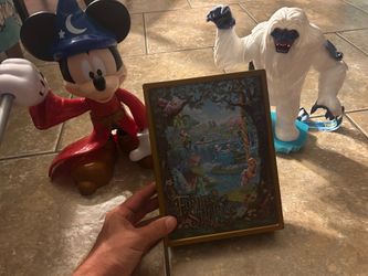 Disney parks yeti popcorn  bucket from Disneyland.   A fantasy springs box from Tokyo Disney and a sorcerer Mickey Mouse figurine