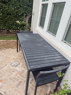 Exterior metal dining table and 4 chairs