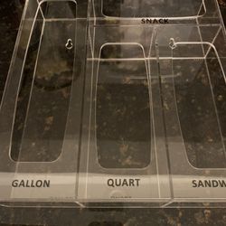 Brand New Acrylic Bah storage organizer.  Can be placed on a draw or hung on a wall. Holds Gallon, Quart, Sandwich and Snack bags