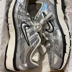 P-6000 Metallic Sliver  7 Men 8.5 Women