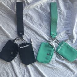 Lululemon bundle two brand new dual pouch wristlets