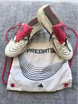 Size 12 predator mild used cleats-soccer