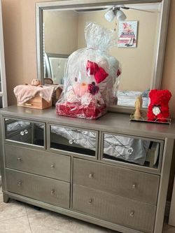 Bedroom set for sale in excellent condition. The set includes:  * Bed frame * Mattress (included) * Dresser with mirror * Nightstands