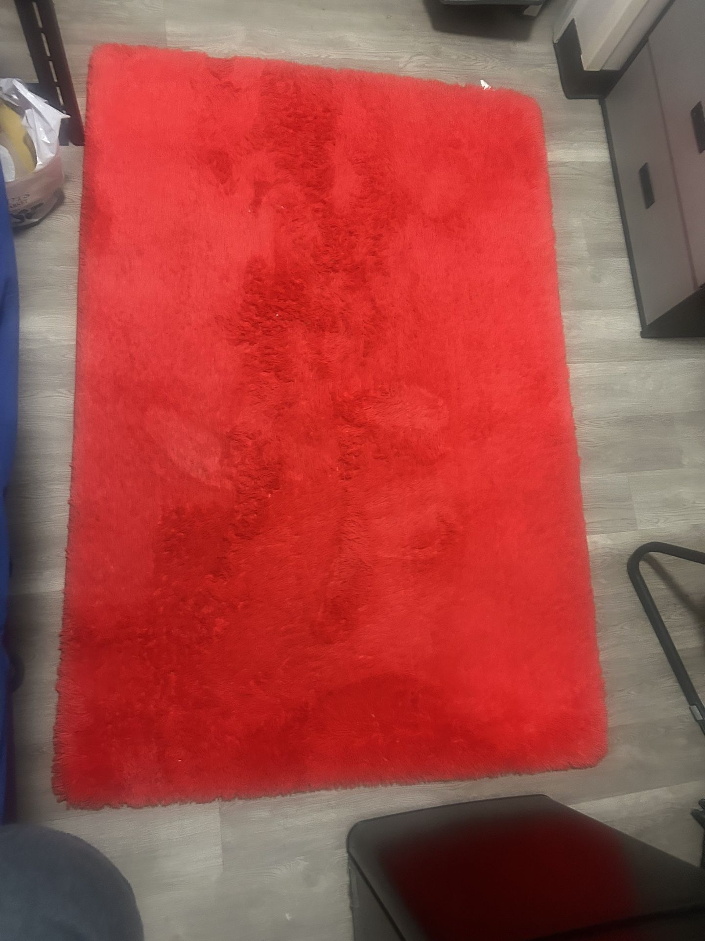 Red furry grass rug