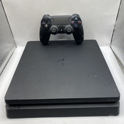 PlayStation 4 Slim 1TB System (PS4 Slim) [Controller And Cords Included] [Good]