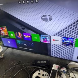  White And Black Xbox One S with Two Controllers