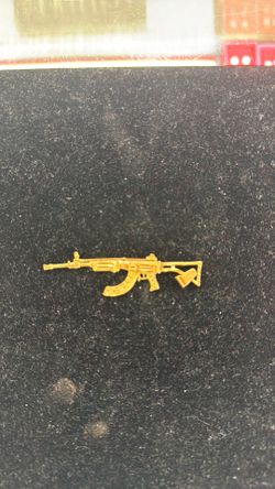 14KT RIFLE PENDANT