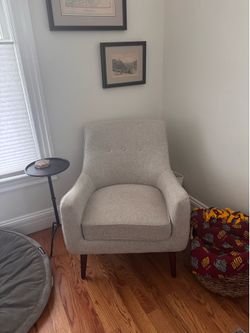Living spaces grey upholstered chair