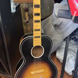 Vintage 1960s Kay K1160 parlor-sized acoustic guitar,