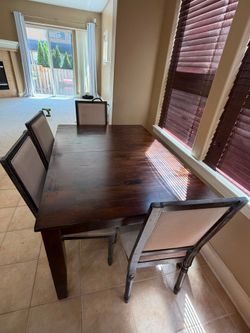 Moving Sale - Solid wooden Dining Table - 4 chairs