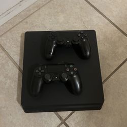 PS4 Slim + 2 Controllers – Ready to Game
