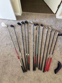 Assortment of golf clubs