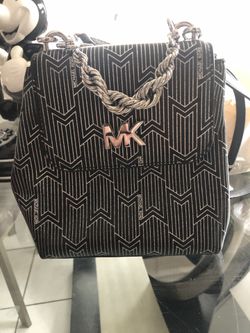 Silver Michael Kors backpack-never used!