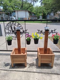 Planters Boxes with artificial flowers 💐 u can put real flowers on the bottom box 17x17 x16 $80  each