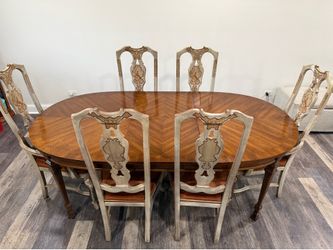 Walter Smith Extendable Dinning table with 6 chairs.