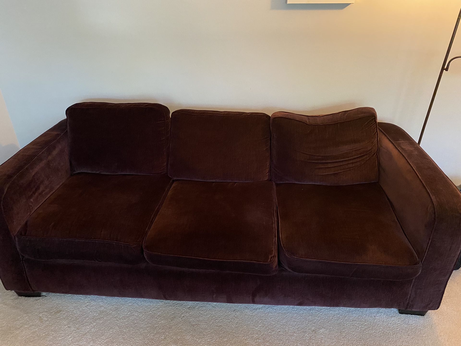 Deep purple living room couch, love seat, foot stool. Fair condition ( two cushions have tears that can be sewn and leg on foot stool needs to be pla
