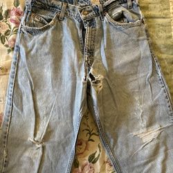 Vintage 80s/90s Levi’s Men’s Jeans with fashionable holes and tears