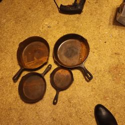 4 cast iron pans