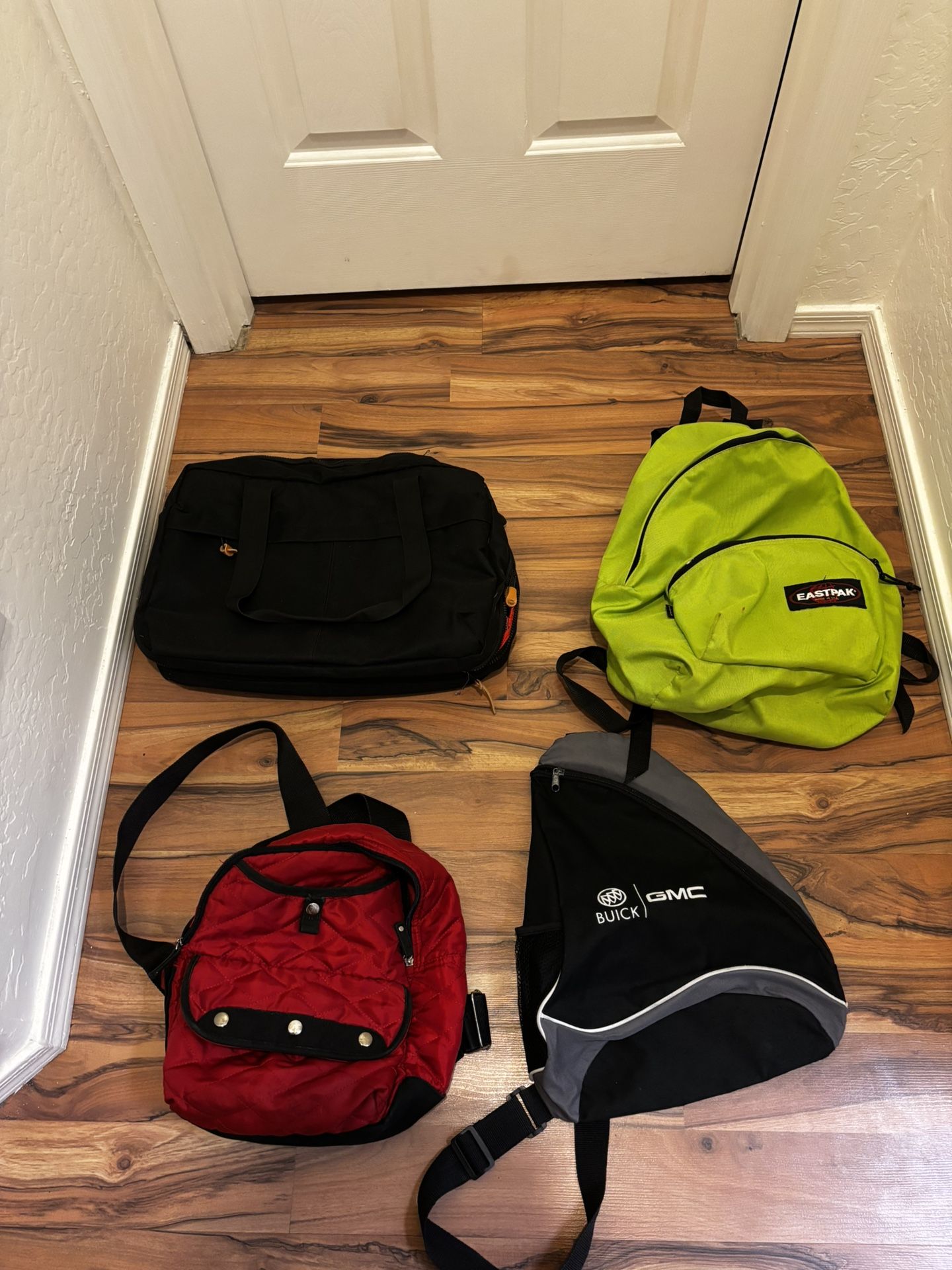 4 backpacks and bags