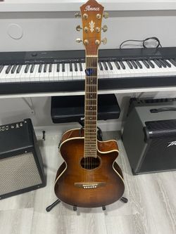 Electroacoustic Guitar With hard Case Included_ Ibanez AEG2011 VV