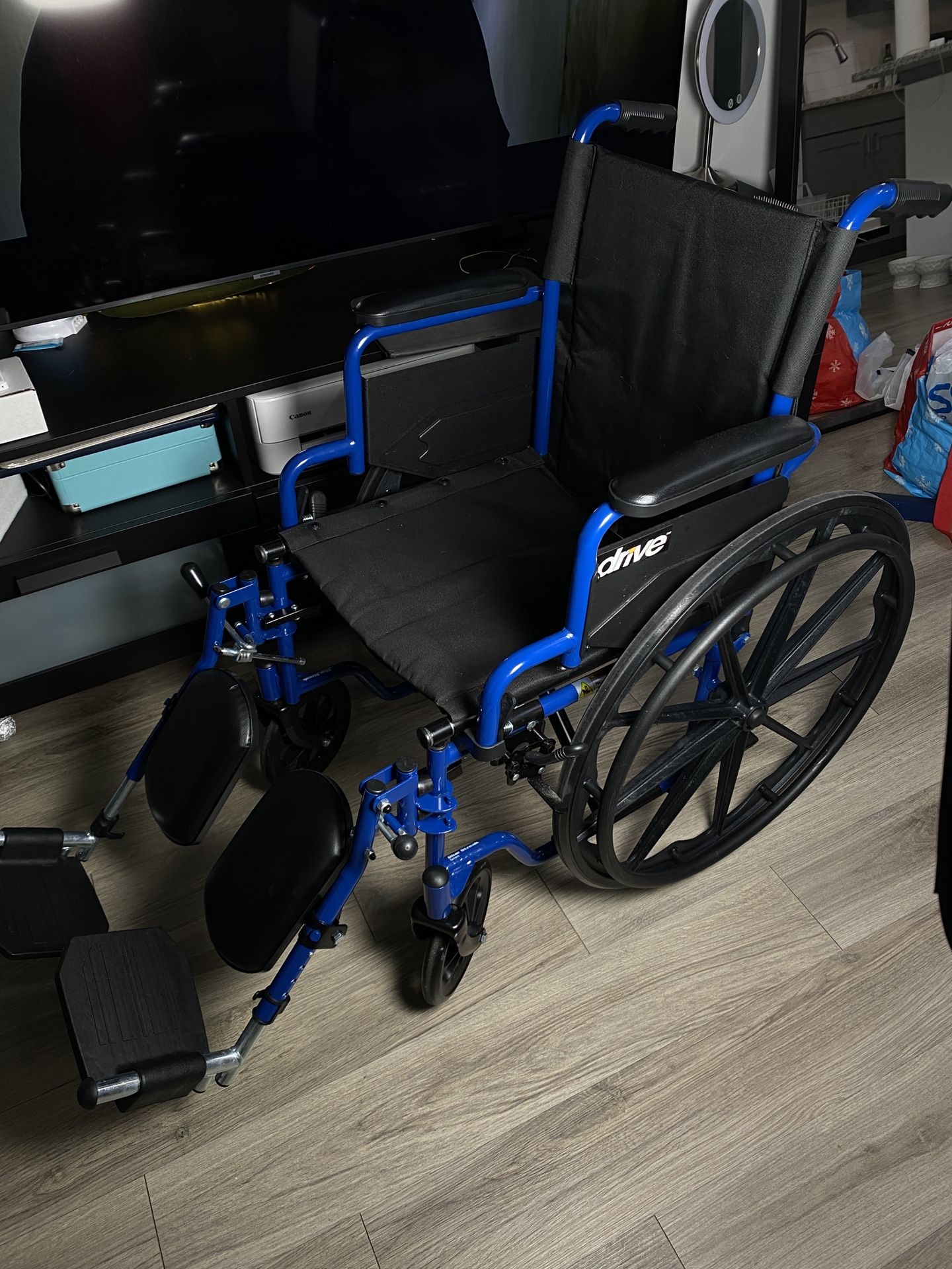 Drive Medical Blue Streak Lightweight Foldable Wheelchair for Adults, Seniors, and Disabled - Swing-Away Elevating Leg Rests and Flip-Back Padded Arms