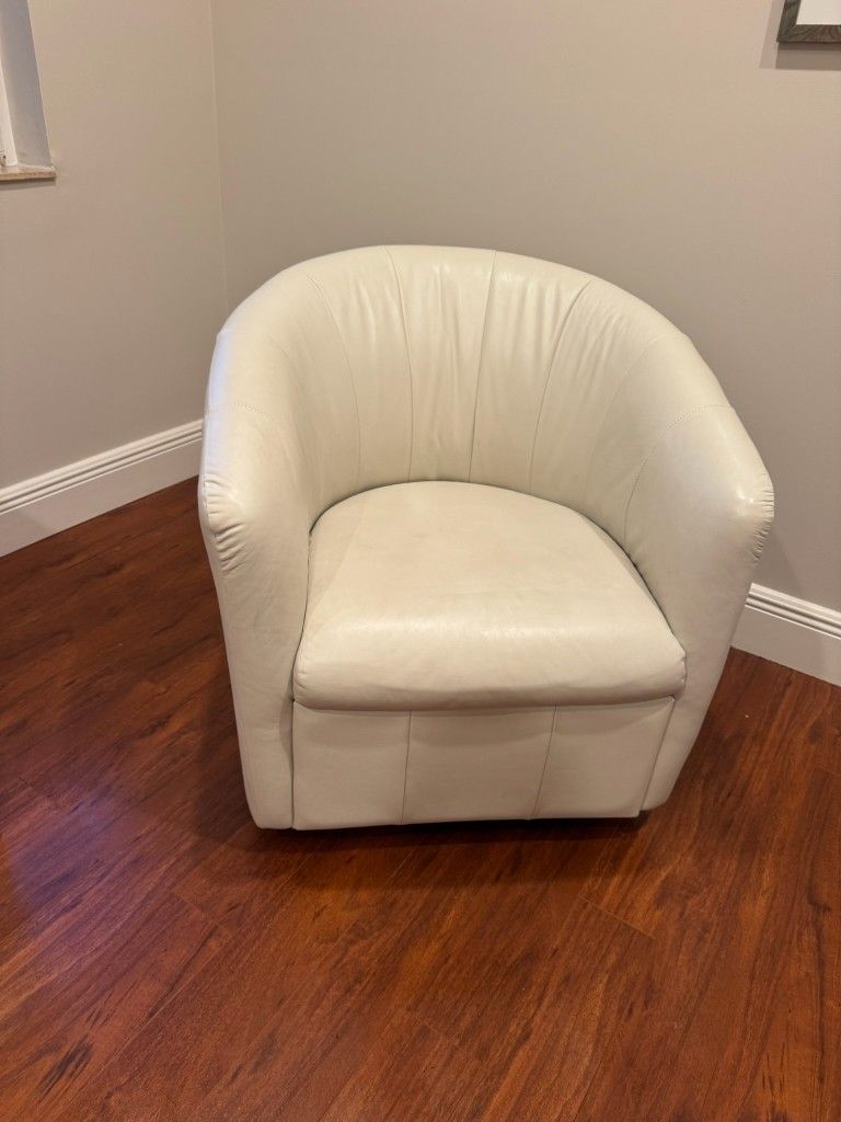 2 White Leather Swivel Chairs