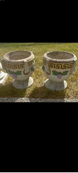 pair of vintage cast concrete Grecian-style garden urn planters.