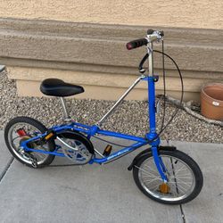 dahon stowaway folding bike ( Works Great with new tires) 