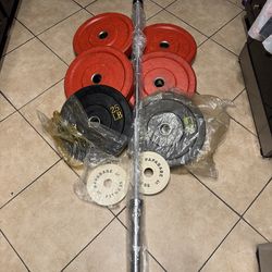 Olympic bumper weights 250lbs total plus 7ft 45lbs bar