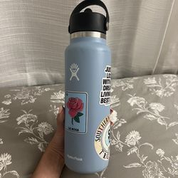 Blue Hydroflask with Hydroflask Stickers