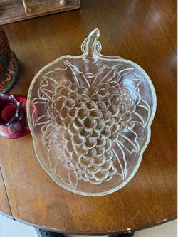 This is a vintage Indiana Glass clear fruit bowl shaped like a cluster of grapes.