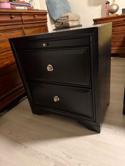 Black wooden night stands