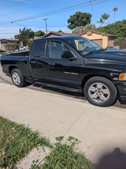 04 Dodge ram 1500 magnum hemi with a supercharger... It's a Beast.. 12300 miles